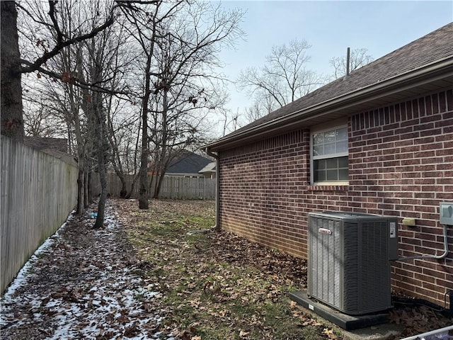 view of yard with central AC