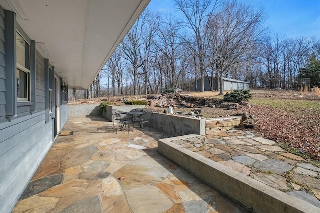 view of patio with outdoor dining area