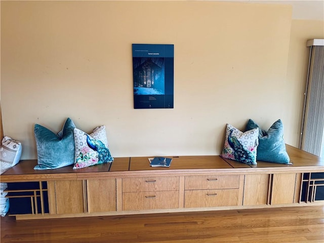 sitting room featuring wood finished floors