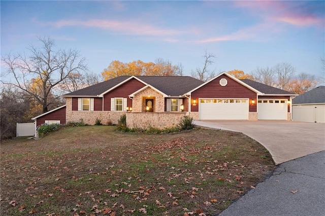 ranch-style house featuring a garage