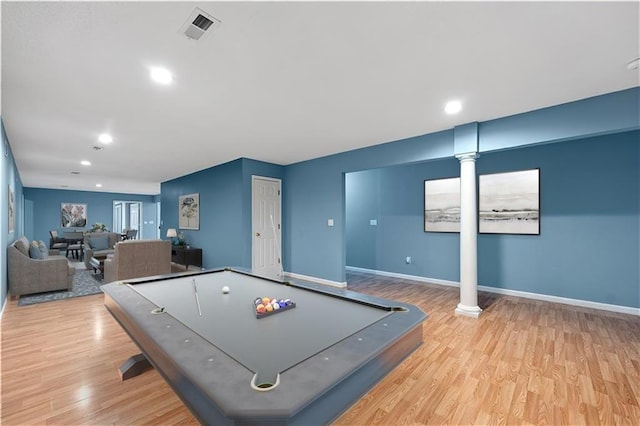 game room with light hardwood / wood-style flooring, billiards, and decorative columns