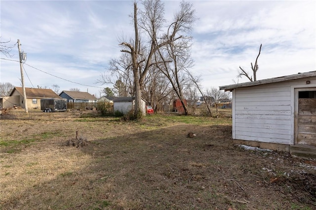 view of yard with a storage shed