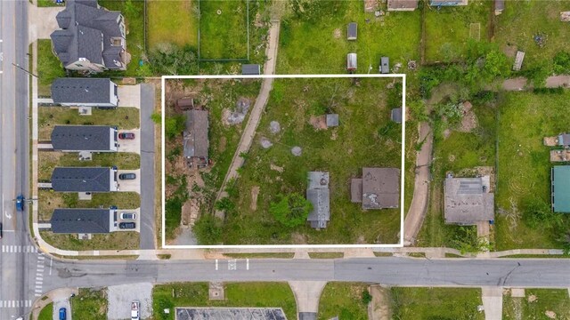 709, 715 N 6th St, Rogers, AR 72756 - aerial overview of property's location with property boundaries highlighted and nearby suburban area