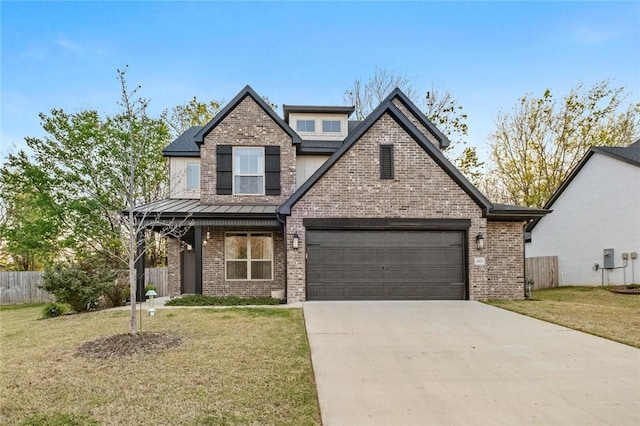 view of front facade featuring concrete driveway, brick siding, fence, and a front yard