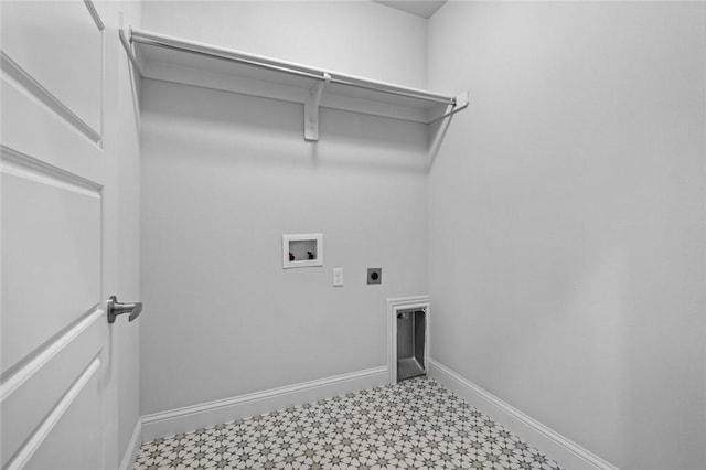 clothes washing area with tile patterned floors, baseboards, washer hookup, electric dryer hookup, and laundry area