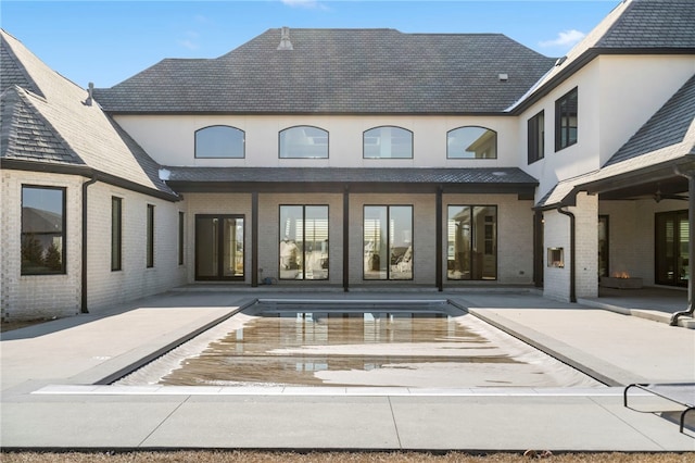 rear view of house with a patio area