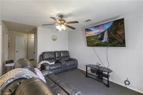 living room featuring a ceiling fan