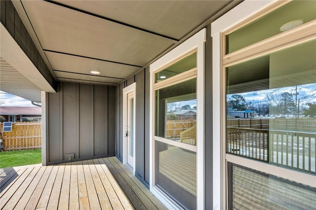 wooden deck featuring fence