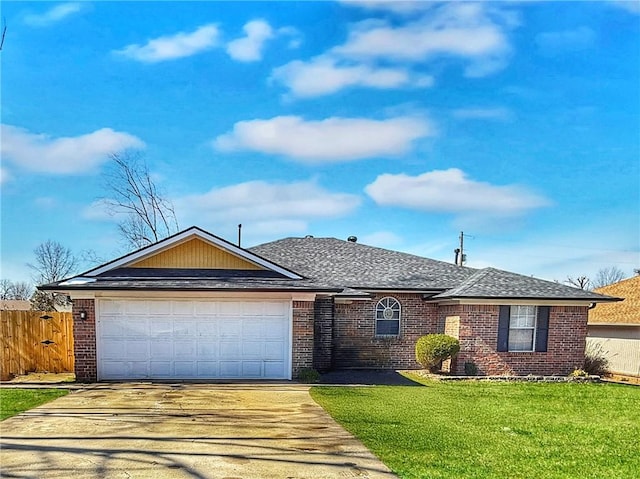 single story home with an attached garage, brick siding, fence, concrete driveway, and a front yard