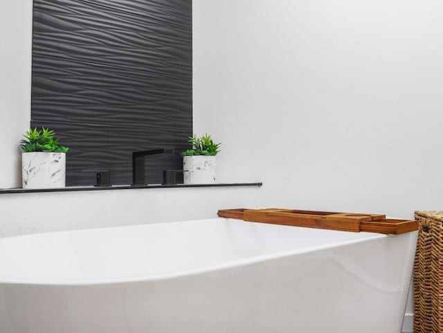 interior details featuring a soaking tub