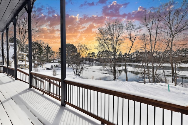 view of snow covered deck