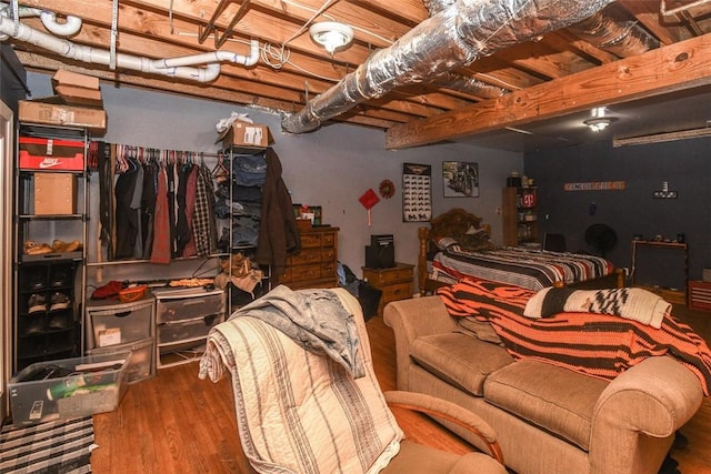 unfinished basement featuring wood finished floors