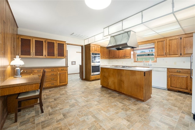 kitchen with stainless steel double oven, light countertops, a center island, dishwasher, and island exhaust hood