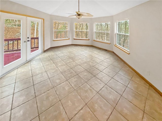 unfurnished sunroom with french doors, vaulted ceiling, and ceiling fan