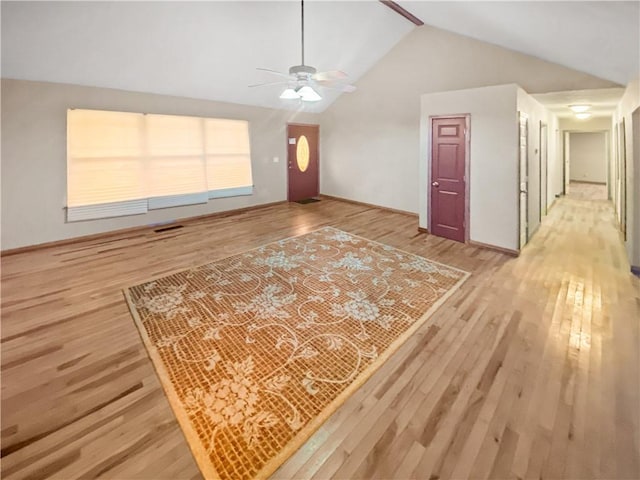 bonus room featuring light wood-type flooring, vaulted ceiling, and ceiling fan