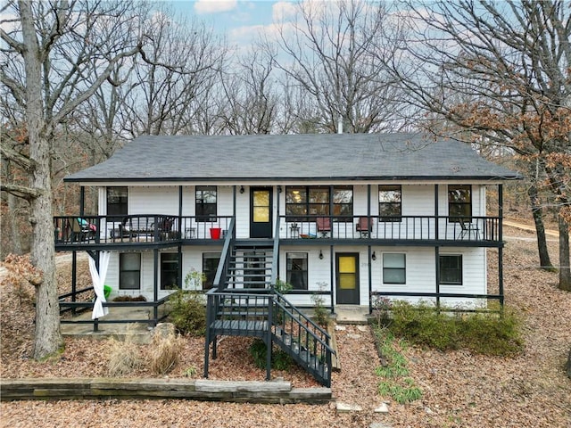 view of front of house featuring stairway