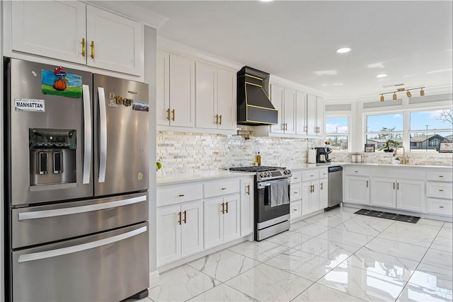 kitchen with stainless steel appliances, white cabinetry, marble finish floor, light countertops, and custom exhaust hood