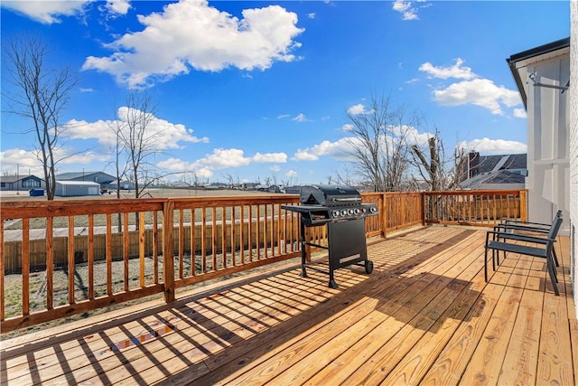 wooden terrace with area for grilling