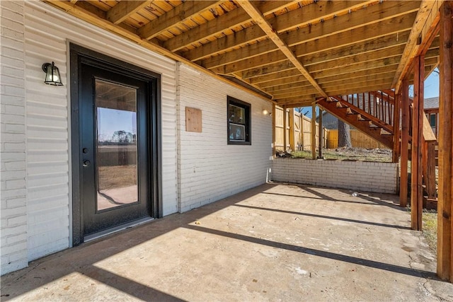 view of patio featuring stairway