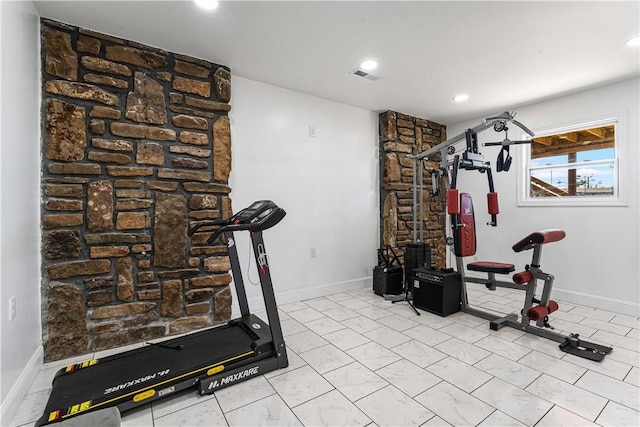 exercise area featuring recessed lighting, visible vents, and baseboards