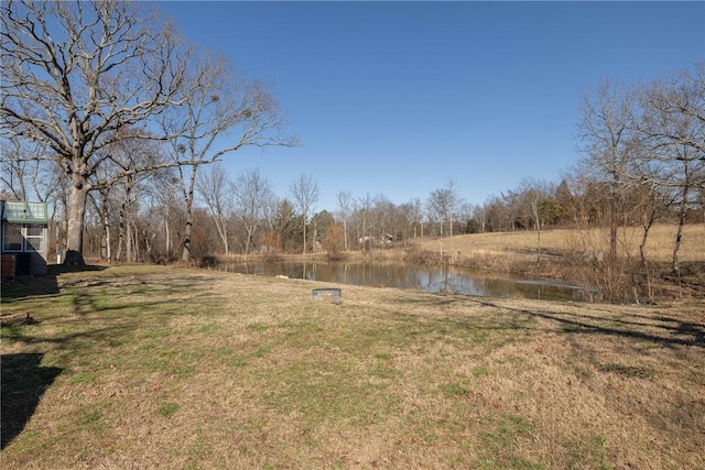 view of yard with a water view