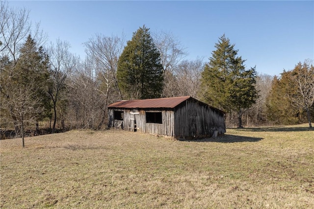 exterior space featuring an outbuilding