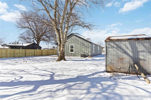 805 S W End St, Springdale, AR 72764 - yard covered in snow featuring an outbuilding