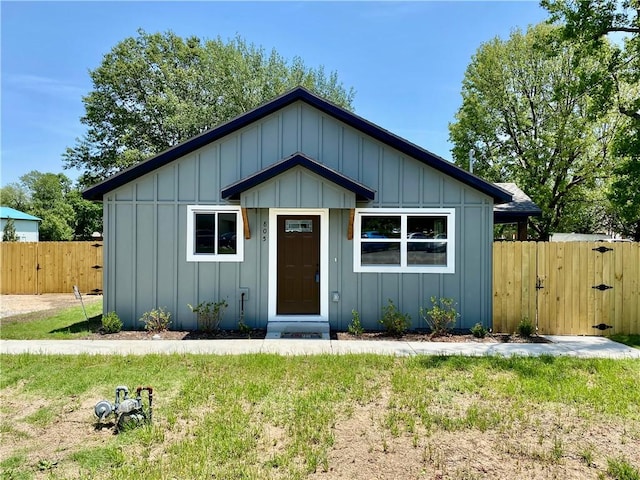 805 S W End St, Springdale, AR 72764 - bungalow-style house featuring board and batten siding and a gate