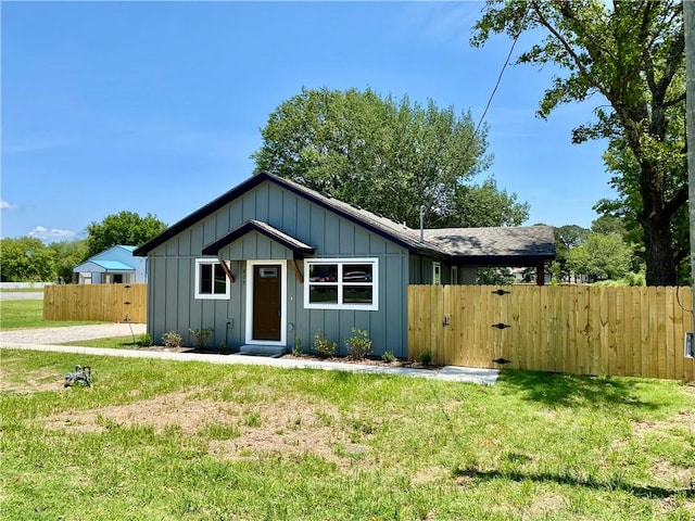 805 S W End St, Springdale, AR 72764 - single story home featuring board and batten siding and a gate