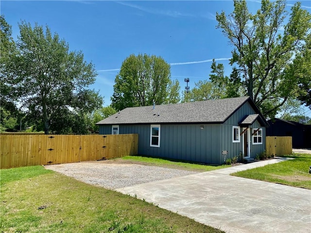 805 S W End St, Springdale, AR 72764 - view of front facade featuring a gate, board and batten siding, and a shingled roof