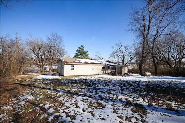 view of snow covered property