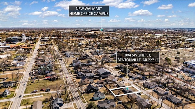 birds eye view of property with a residential view