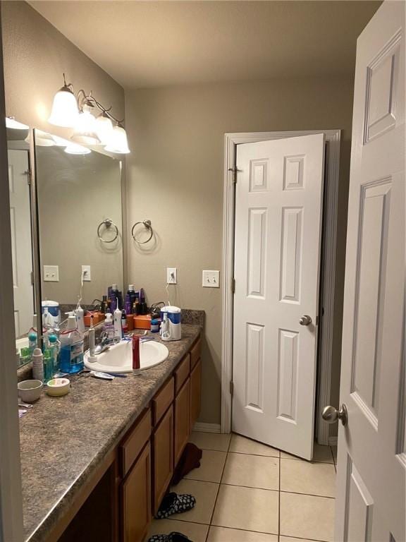 bathroom featuring tile patterned floors and vanity