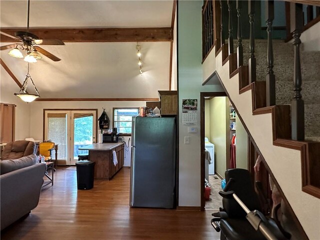 146 Shipps Lndg, Norfork, AR 72658 - kitchen featuring freestanding refrigerator, a ceiling fan, beam ceiling, and wood finished floors