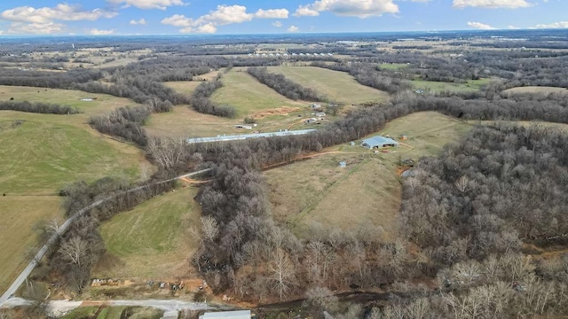 birds eye view of property featuring a rural view