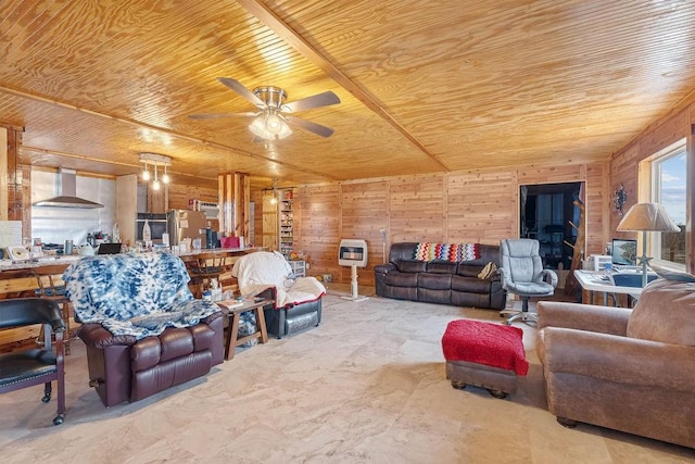 living area with wood ceiling, wood walls, heating unit, and ceiling fan