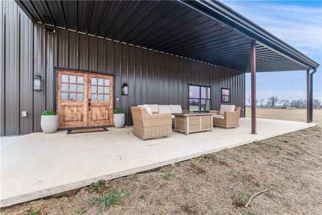 view of patio / terrace with an outdoor hangout area and french doors