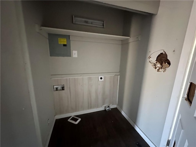 clothes washing area featuring laundry area, electric panel, dark wood-style flooring, hookup for a washing machine, and electric dryer hookup