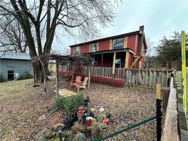 view of front of house featuring a chimney