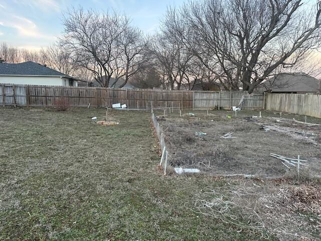 view of yard featuring a fenced backyard