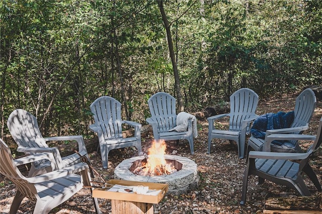 view of patio featuring an outdoor fire pit