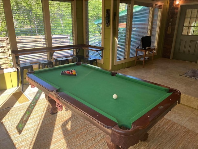 playroom featuring a healthy amount of sunlight, light tile patterned floors, and pool table