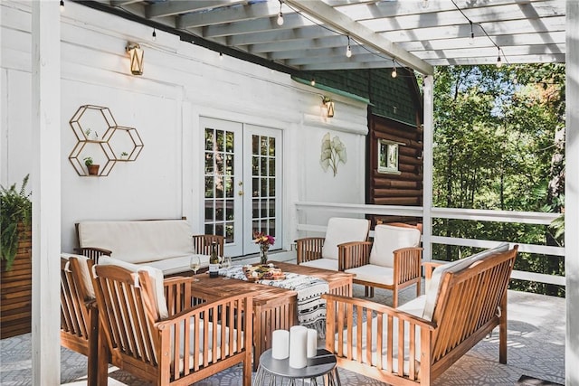 wooden terrace with french doors, an outdoor living space, and a pergola