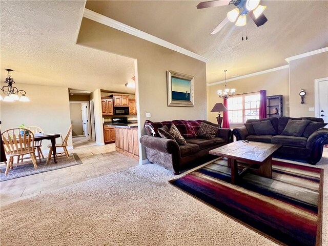 living room with a textured ceiling, ornamental molding, and ceiling fan with notable chandelier