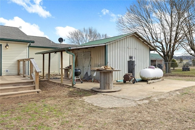 view of outdoor structure with fence