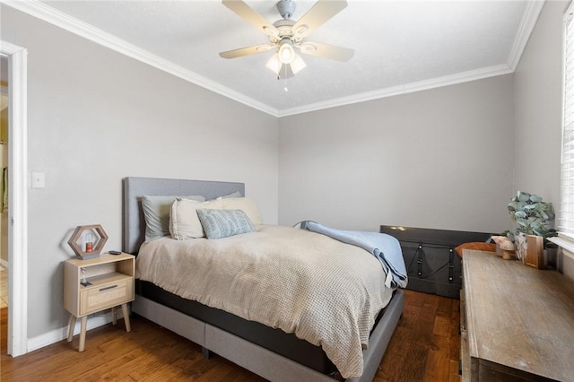 bedroom with dark wood-style floors, ceiling fan, ornamental molding, and baseboards