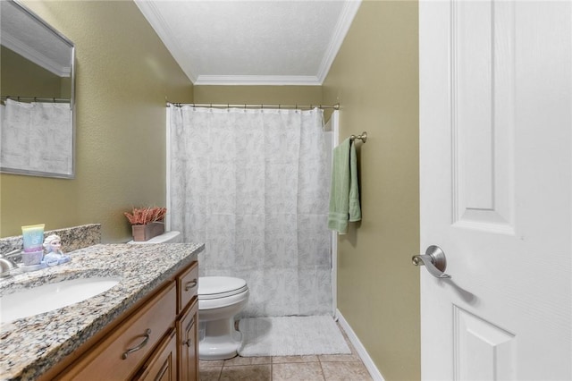 bathroom with baseboards, toilet, ornamental molding, tile patterned flooring, and vanity