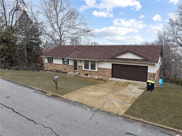 ranch-style home featuring a shingled roof, a front lawn, concrete driveway, a garage, and brick siding