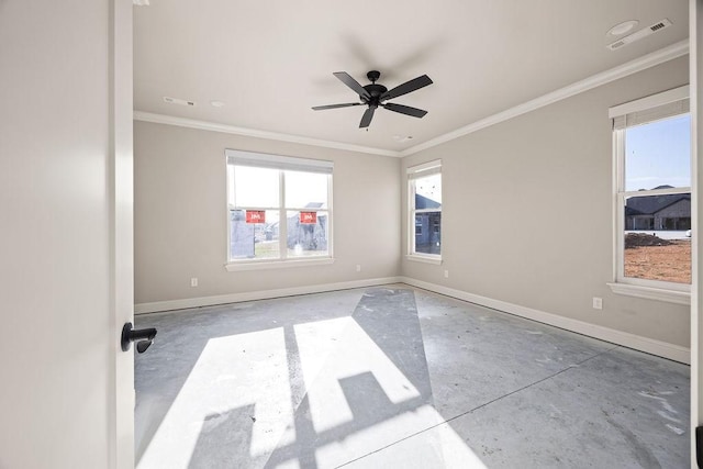 empty room with concrete flooring, crown molding, a ceiling fan, visible vents, and baseboards