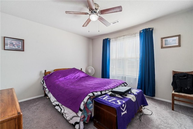 bedroom featuring carpet flooring, visible vents, and baseboards